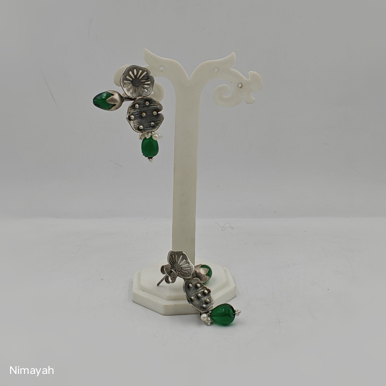 Embrace Elegance with Green Buds Earrings: A Tale of Tradition and Modernity
