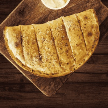 Savoring Happiness: How Paneer Tikka Stuffed Garlic Bread Solves Your Snack Dilemmas