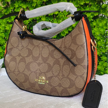 Embrace Timeless Elegance: How the Coach Signature Coated Canvas Transforms Your Lifestyle