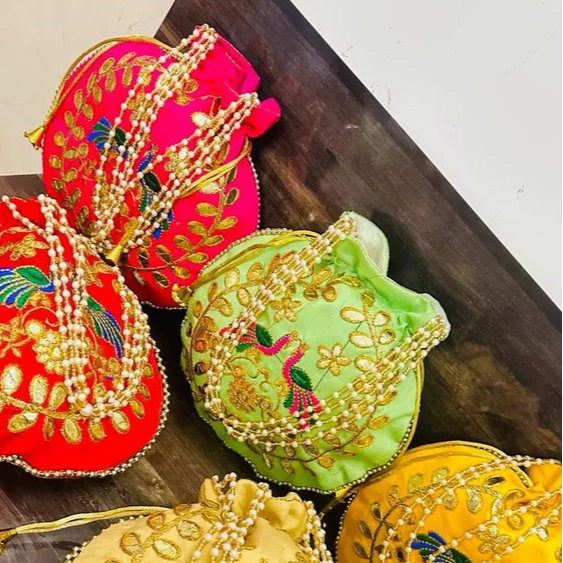 HAMNAYA HANDICRAFT - Embrace Elegance with the Exquisite Fancy Potli Bag in Jaipur