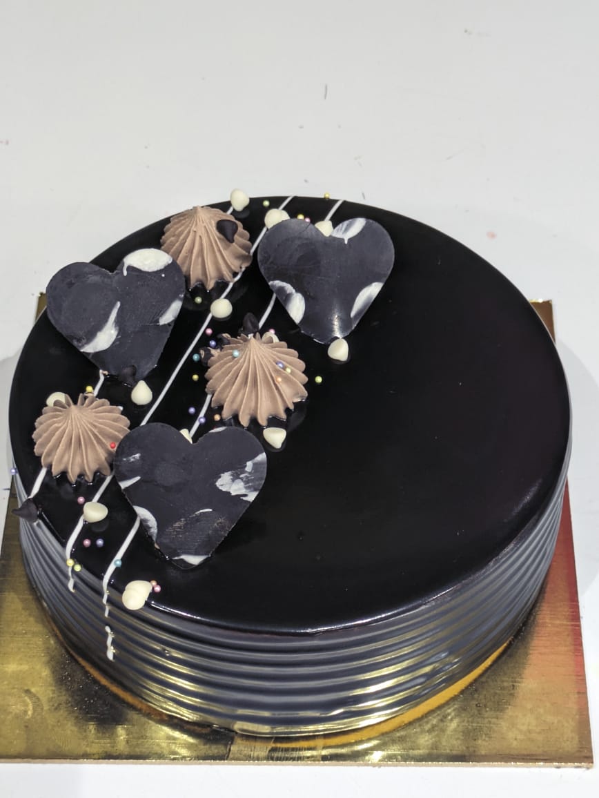 LOVE BITES CAKES N CAFE - Indulge in Sweet Moments with Our Delectable Chocolate Chips Cake in Pune