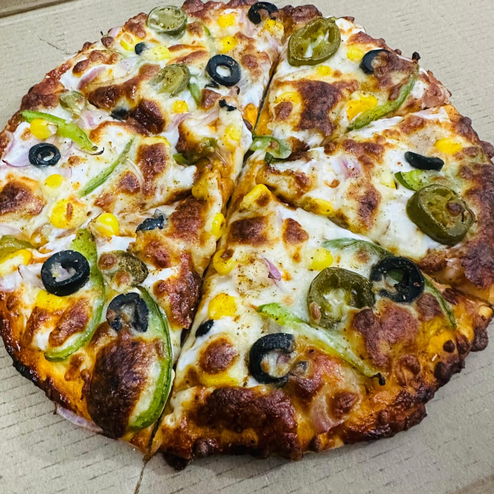 VINTAGE CAKE STUDIO - Savor the Perfect Slice: How Mexican Pizza Brings Joy to Rina's Family Gatherings in Sirhind