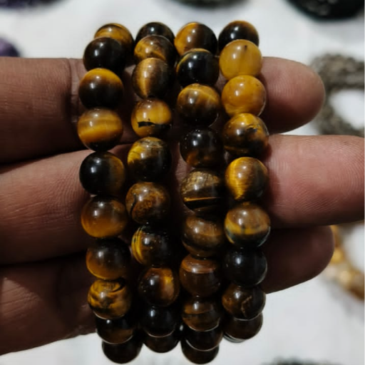 MAHALAXMI CRYSTAL - Embrace Confidence and Clarity with the Tiger Eye Bracelet in Aldona