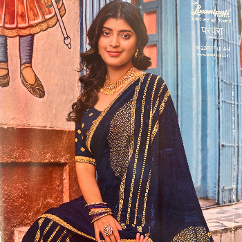 Laxmipati saree in blue elegantly displayed at Santosh Vastralaya, Chandauli - Image 1
