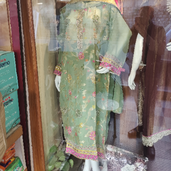 Stylish premium suits for men displayed at SHAGUNA ENTERPRISES in Shimla. - Image 4