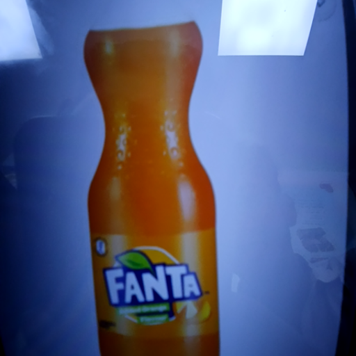 Refreshing Fanta soft drink in a chilled bottle, showcasing vibrant orange color, available at JAIN CONFECTIONERY AND PROVISI