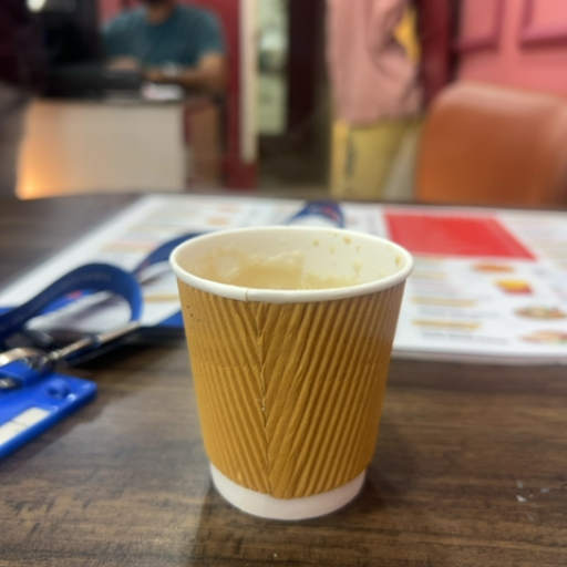 Delicious hot coffee served in a cup with steam rising, showcasing the rich aroma at DEVA SALES in DHAR.