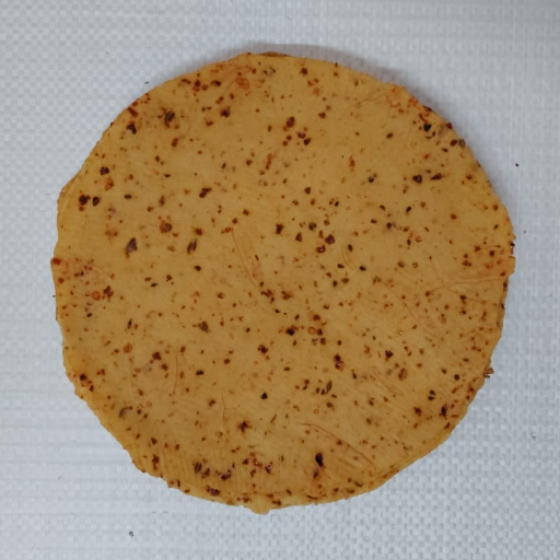 Crispy chana masala papad 1kg pack displayed attractively on a wooden surface — chana masala papad in Bikaner - Image 1