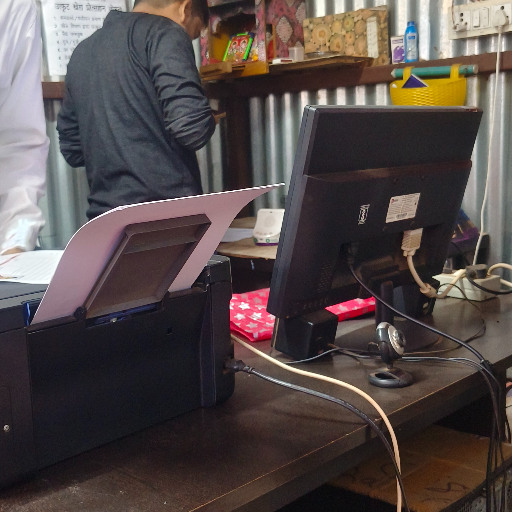 Online work setup with a laptop and workspace - Online Work in Balod
