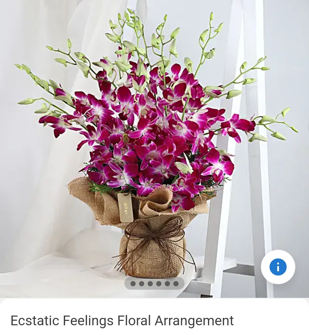 Classy Orchid Arrangement featuring purple orchids in a glass vase, Pune