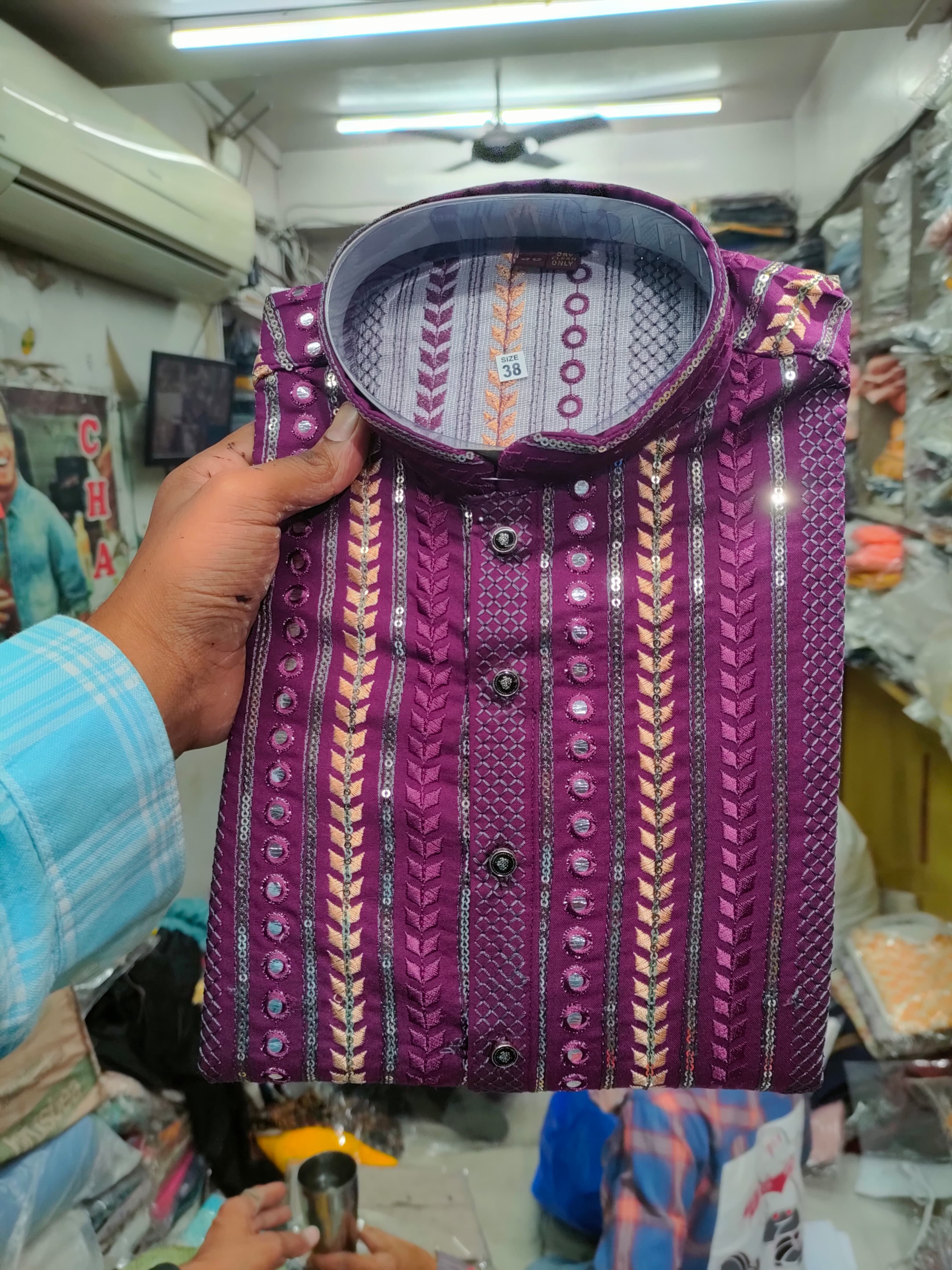 Stylish ethnic men's kurtas displayed at AADI STORES in GJ
