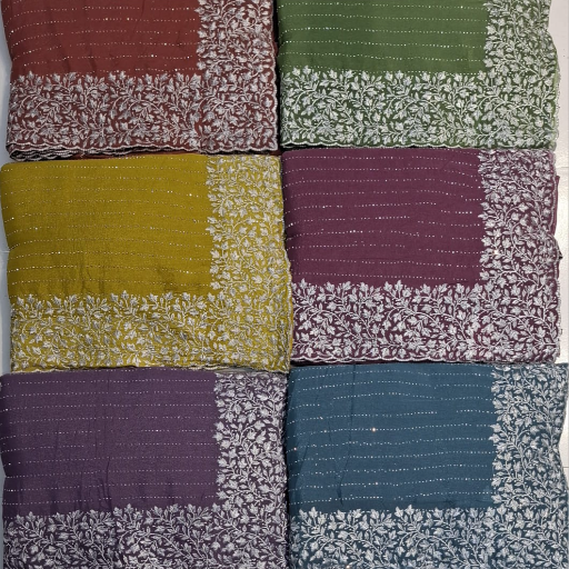 Luxurious saree in vibrant colors with intricate patterns, showcased elegantly in Jalgaon, perfect for special occasions.