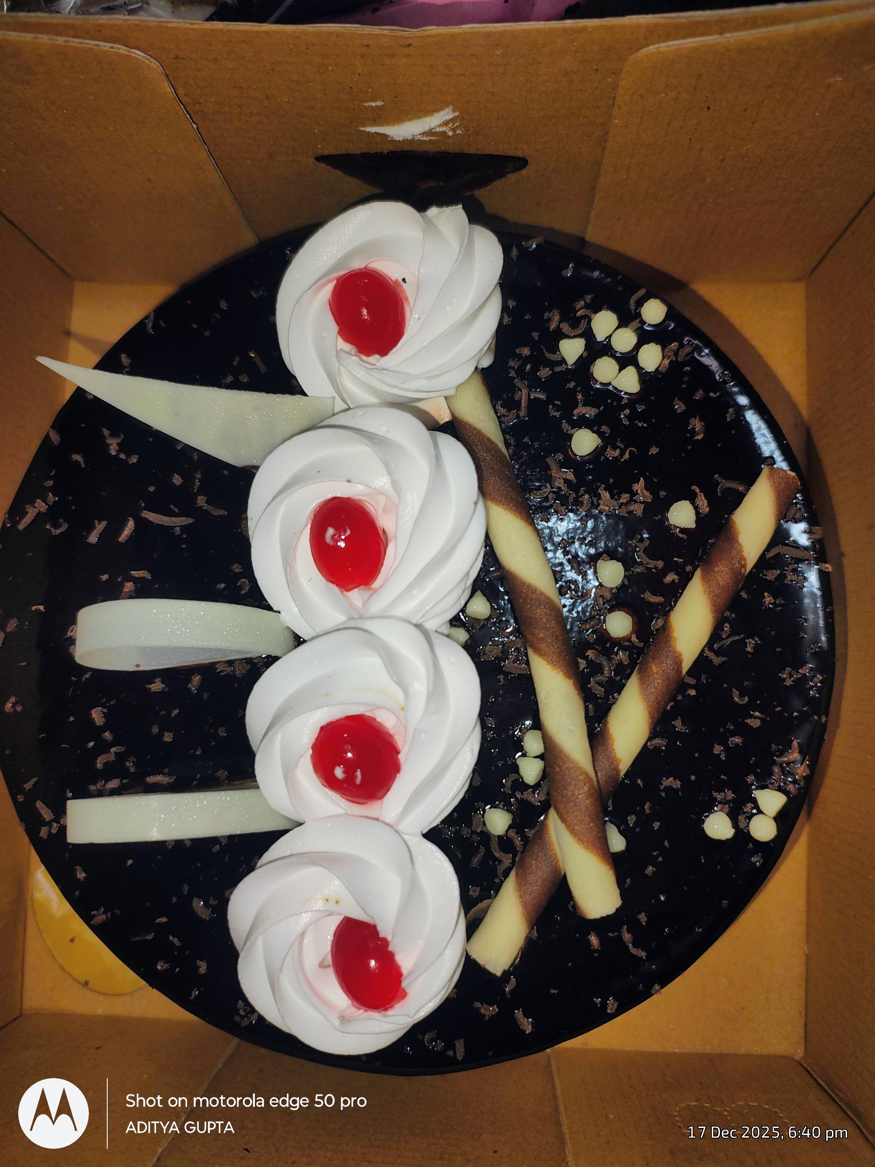 Delicious birthday cake with creamy frosting and decorative toppings from Aditya Kirana Store in Rae Bareli, perfect for cele