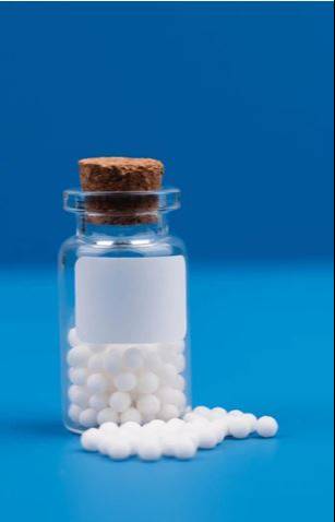 SOS Stone Aid packaging with clear labeling, designed for kidney stone relief, displayed on a surface in Thrissur.
