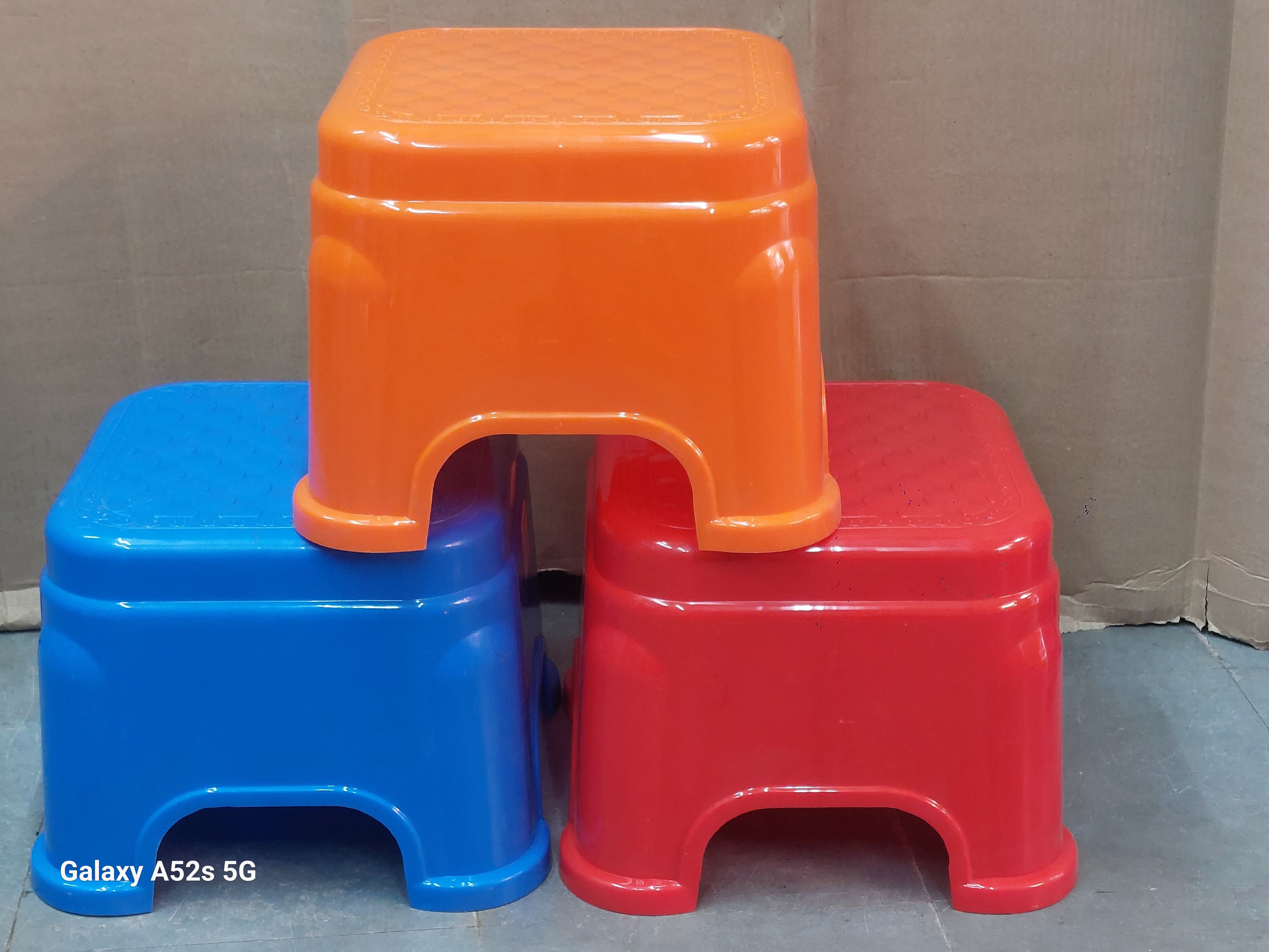 Colorful Vibrant Kids Plastic Stool displayed in a bright setting in Hyderabad