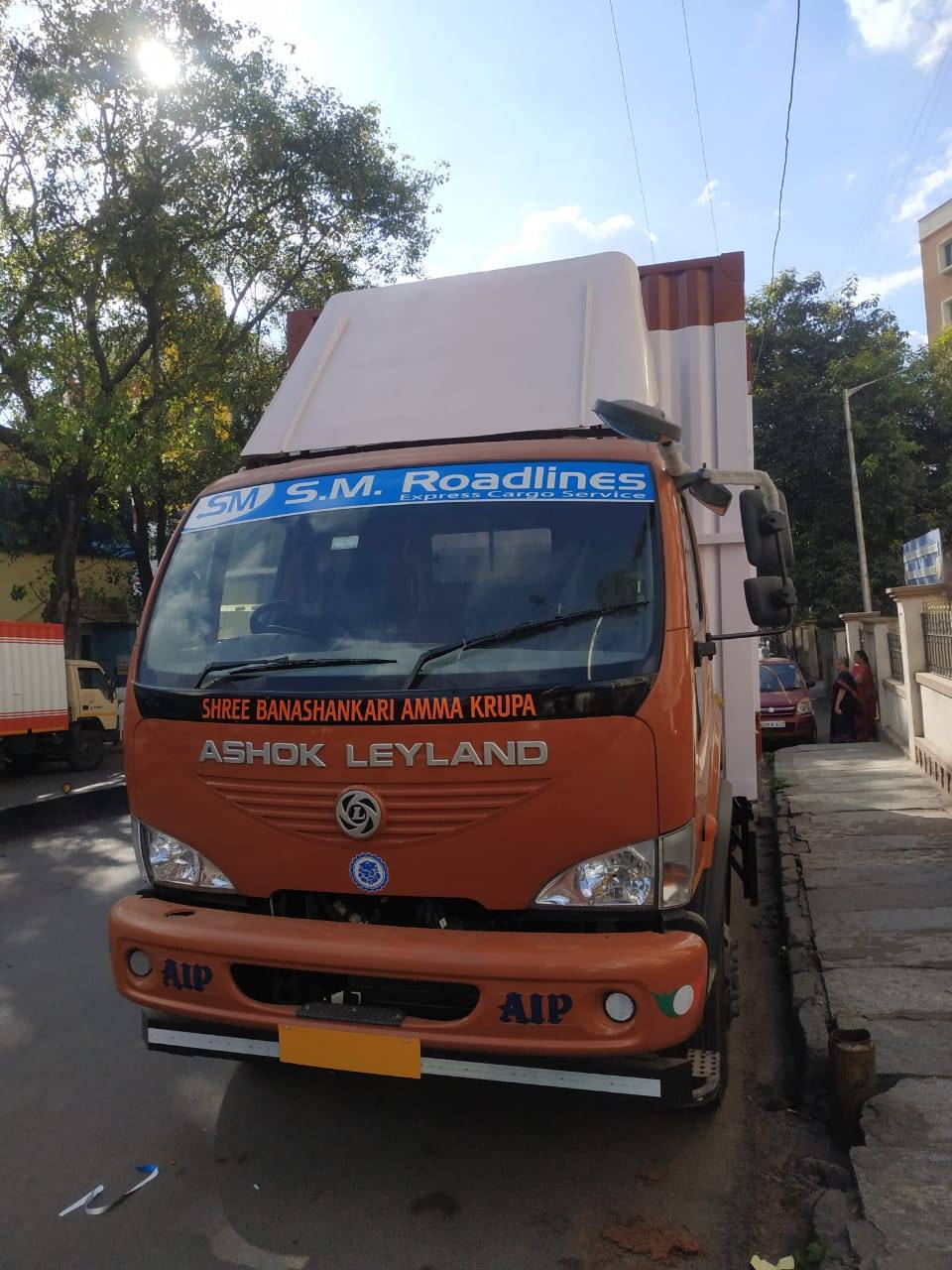 Reliable Ashok Leyland cargo truck for transportation in Bengaluru, showcasing a sturdy design and spacious cargo area.