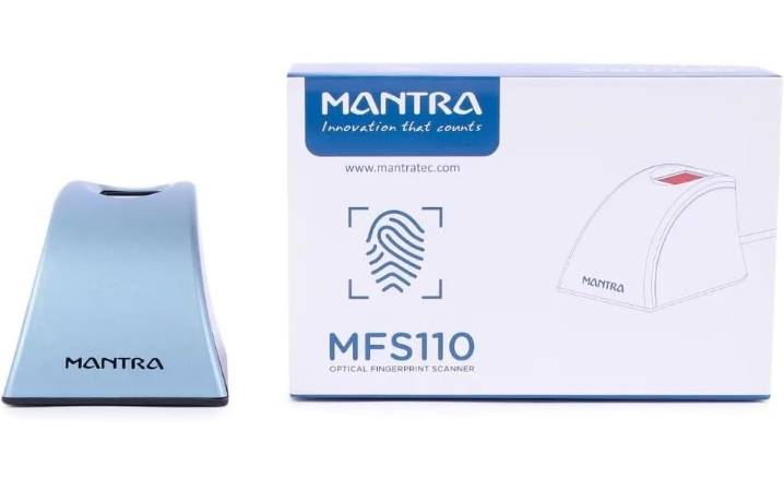Mantra Fingerprint Scanner displayed on a table in Agartala, showcasing its compact design and USB connectivity. - Image 1