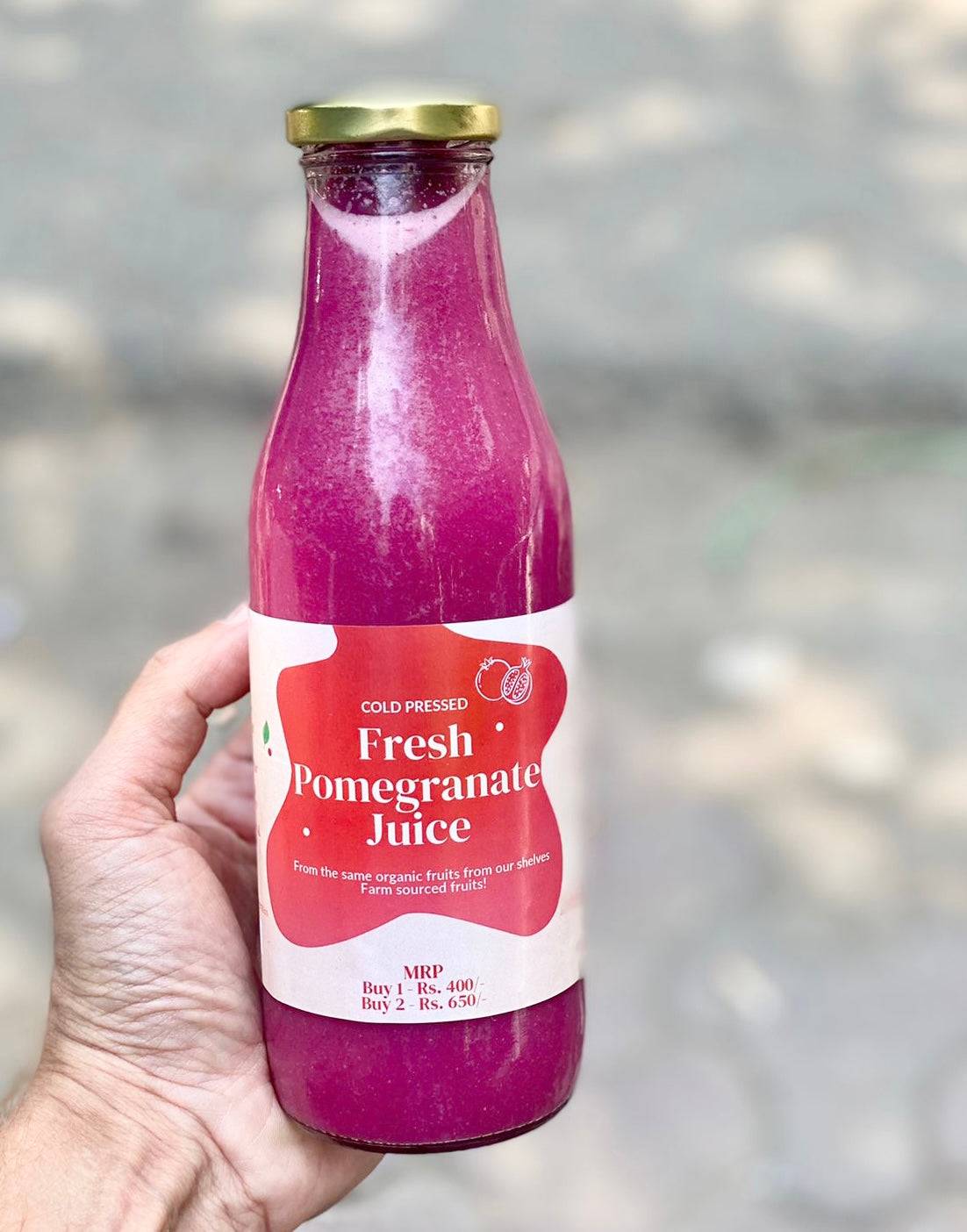 Fresh pomegranate juice in a glass with vibrant red color, showcasing the pure and healthy Juice/Fresh Pomegranate in Jalandh