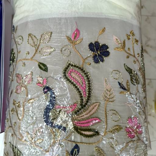 Luxurious silk saree with intricate patterns and rich texture displayed elegantly in VIJAYAWADA, showcasing the exquisite cra