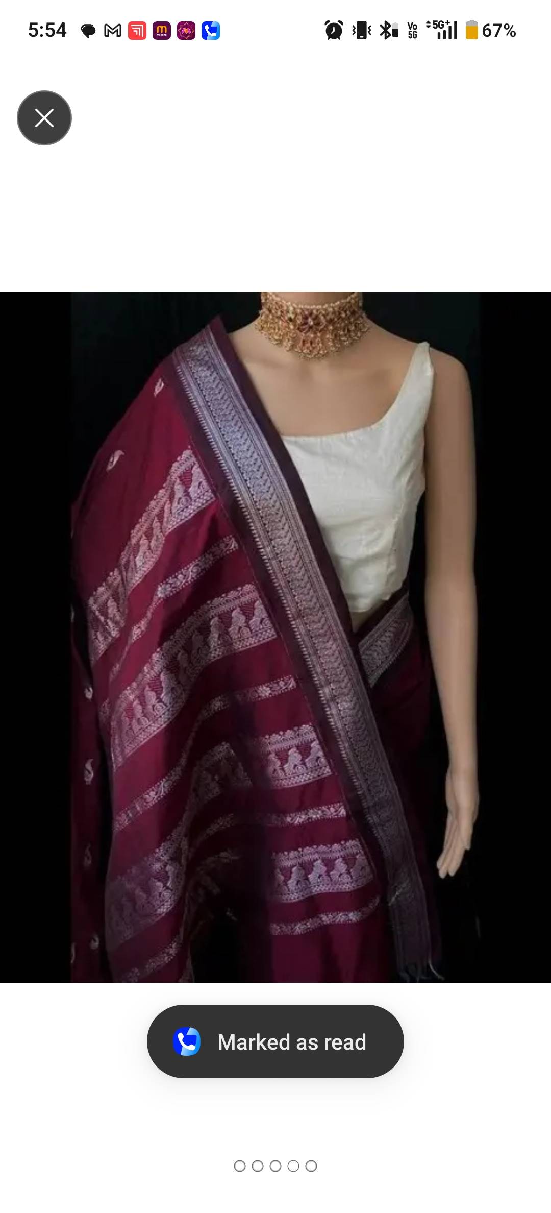 Elegant maroon silk saree with intricate silver zari work from Anjani Saree Shop in KATHDA, showcasing its luxurious fabric a