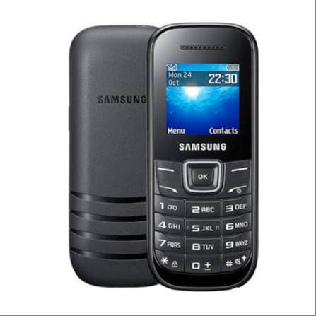 Samsung Guru 1200 Mobile Phone with a durable design and long-lasting battery displayed on a table in Gurdaspur
