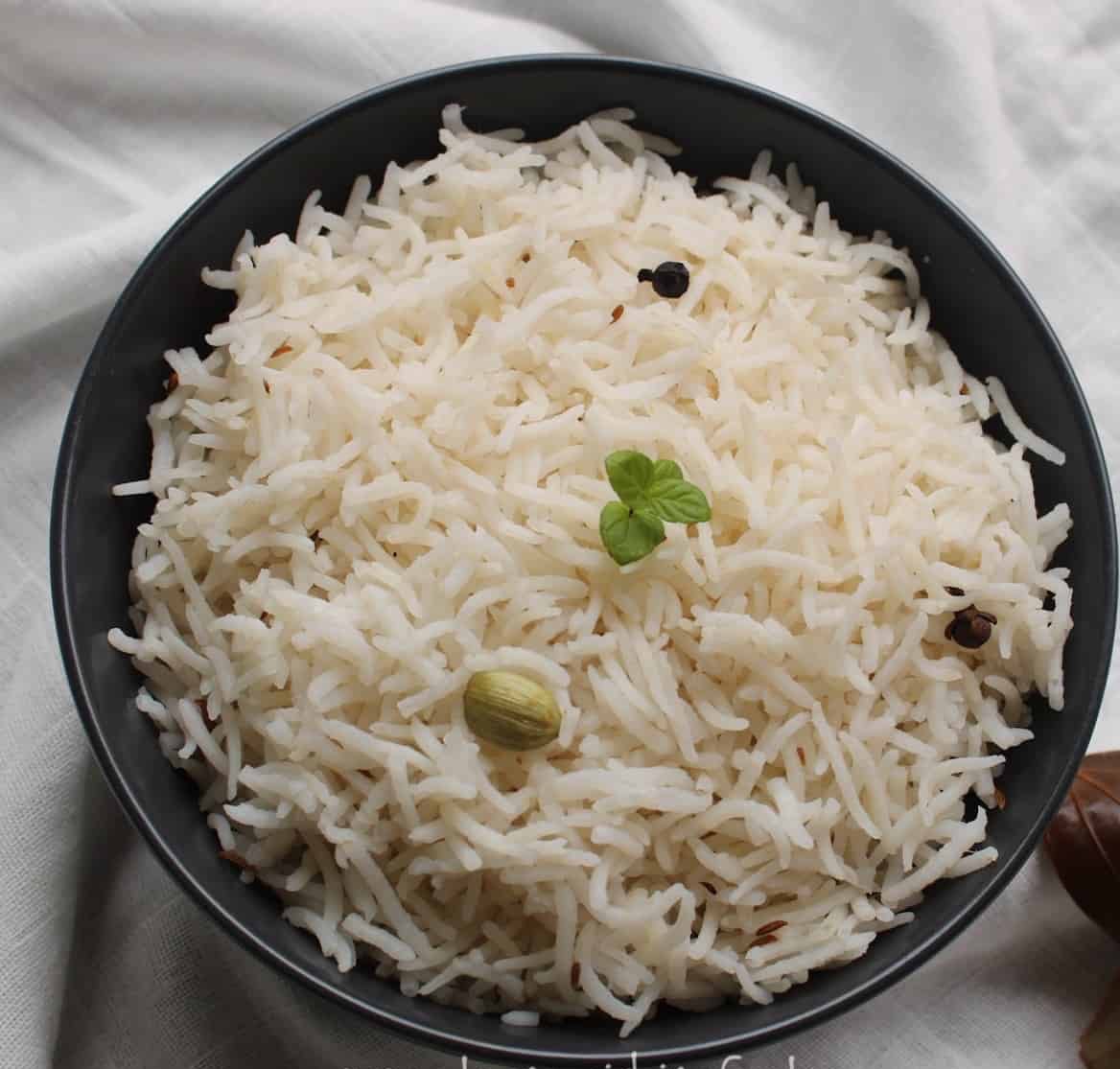 High-quality rice served in a bowl with a natural background, showcasing the nutritious rice from RAJESH DHABA in Dharamshala
