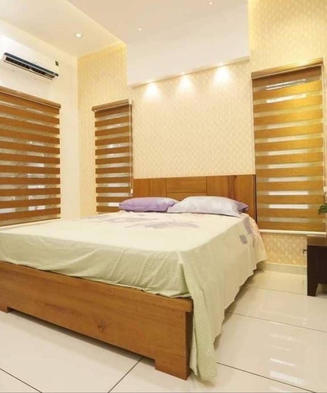 Stylish Zebra Blinds in Kottayam featuring durable nylon fabric and a unique wooden texture design, perfect for light filteri