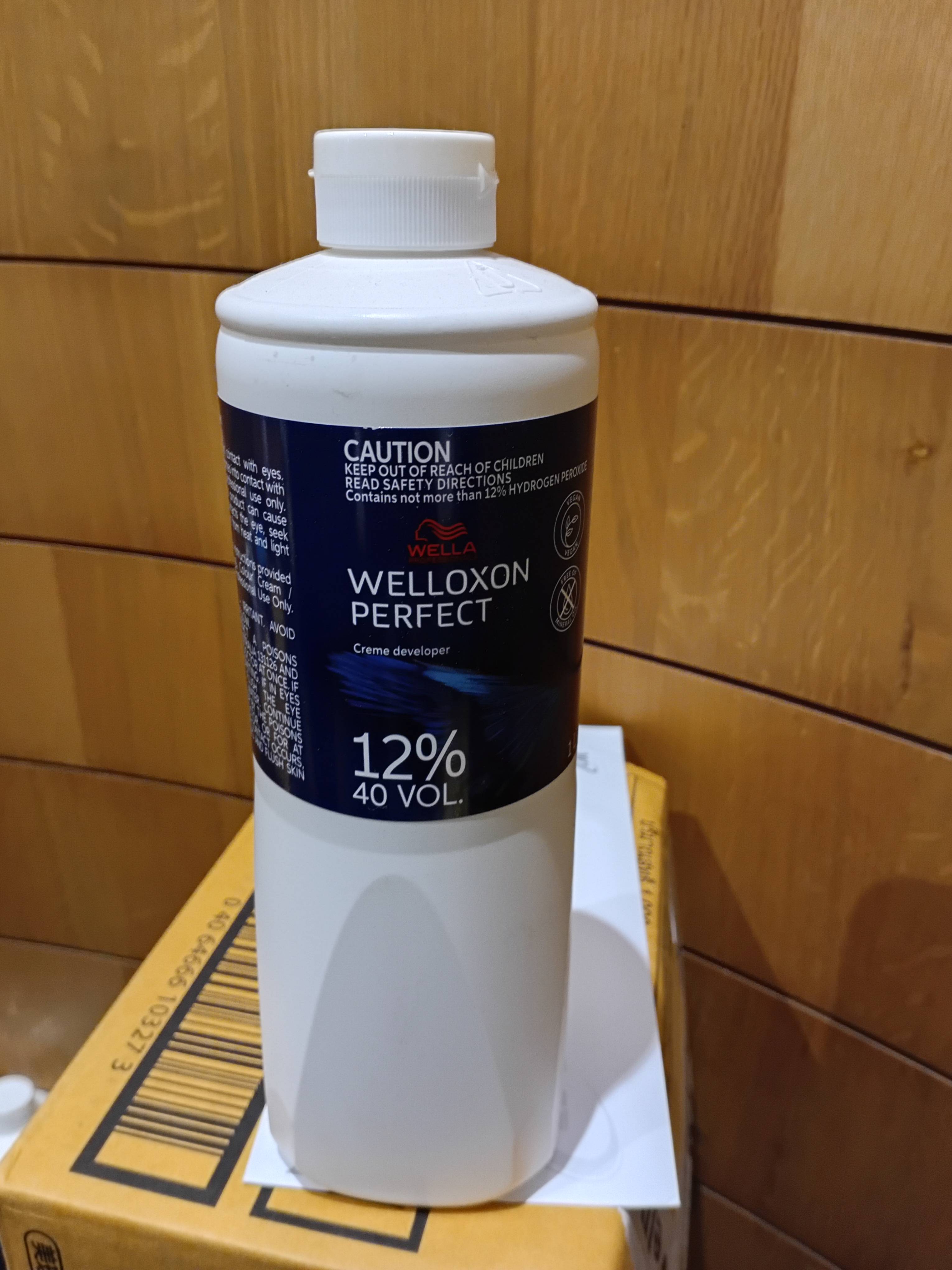 Welloxon Perfect Developer 12% 40 Vol bottle displayed against a neutral background, showcasing its vibrant branding, availab