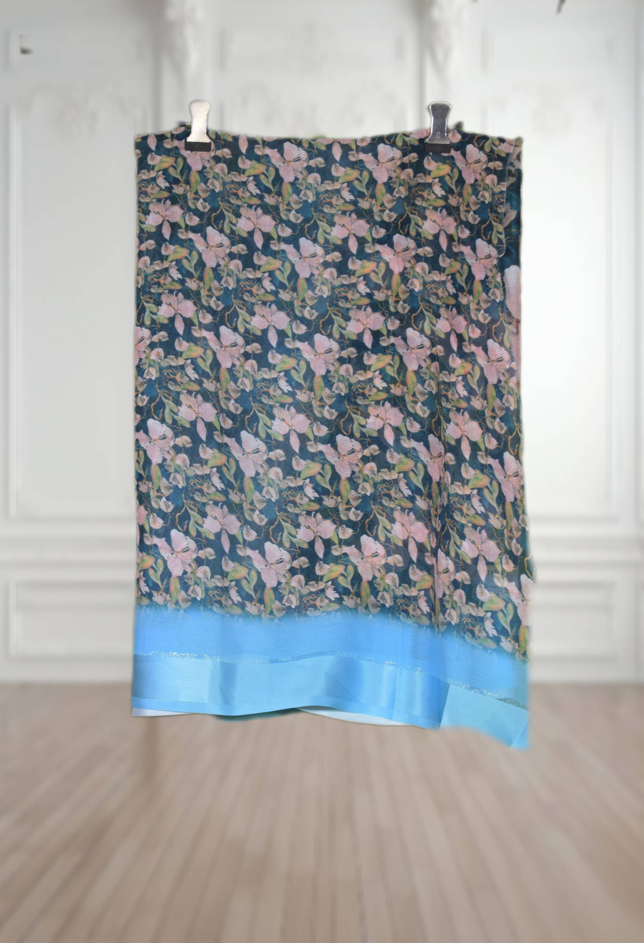 Floral print Ethnic Saree - Shimmer with Satin Patta Border displayed elegantly, showcasing its vibrant colors and luxurious  - Image 2