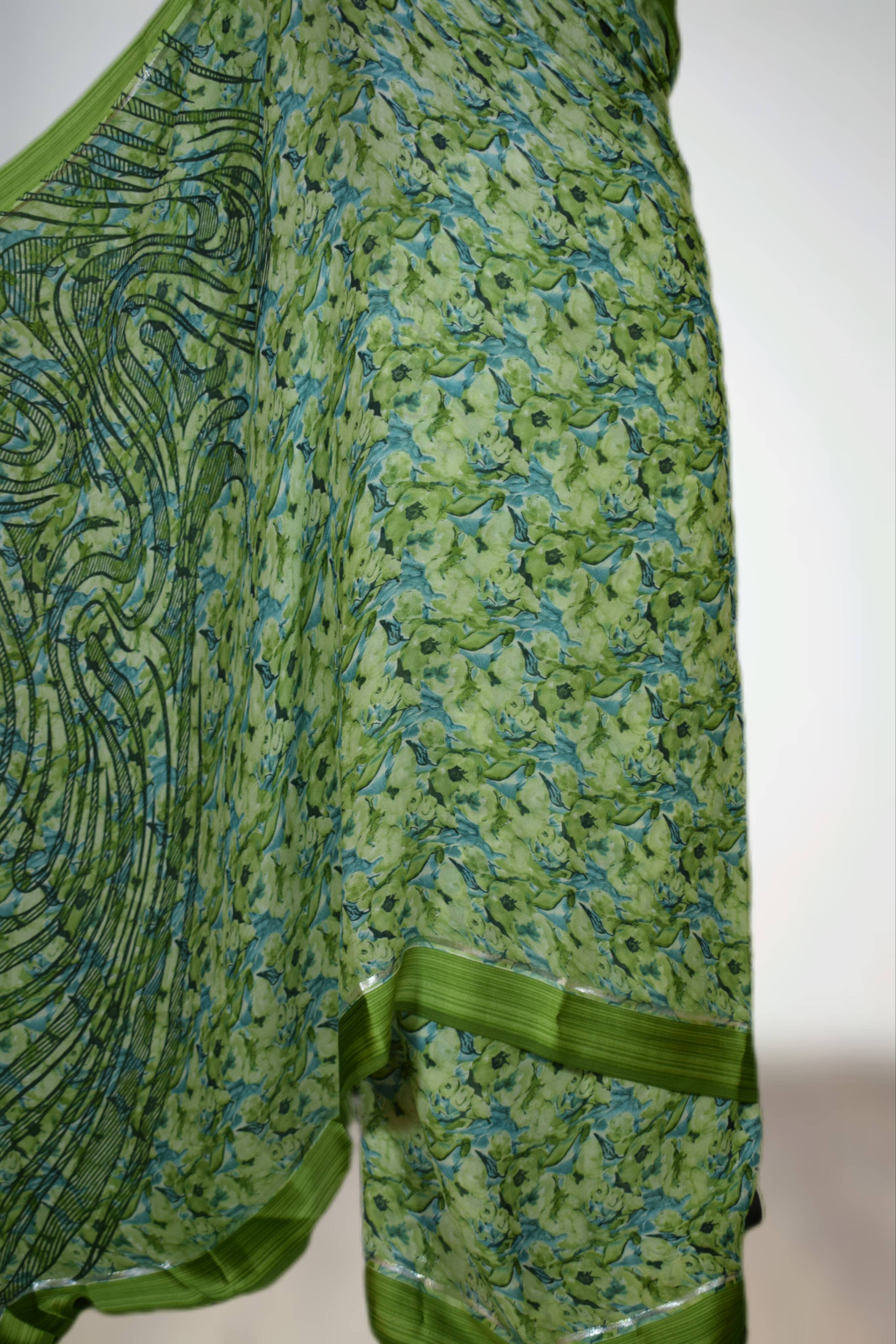 Elegant floral printed satin patta border saree with rich colors and fine detailing, available at SHEETESH SONI in GORAKHPURM - Image 1