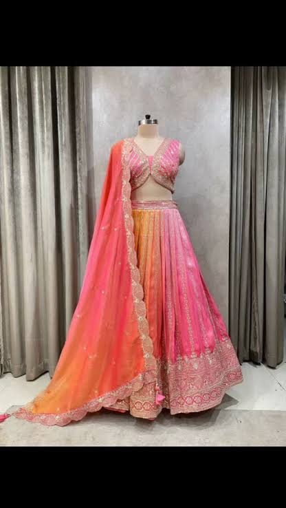 Elegant Bridal Lehnga from AMIT LEHNGA SAREE in Moga, featuring intricate designs and vibrant colors, perfect for weddings.