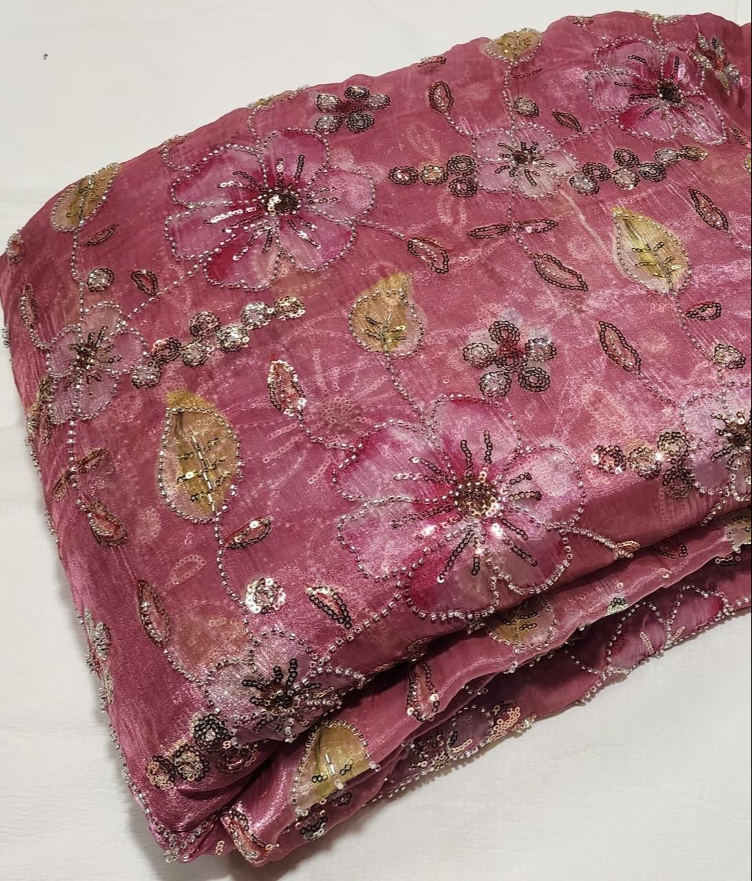 Luxurious Silk Fabric Embroidered Floral Fabric in Vijayawada featuring intricate floral designs and shimmering sequins, perf