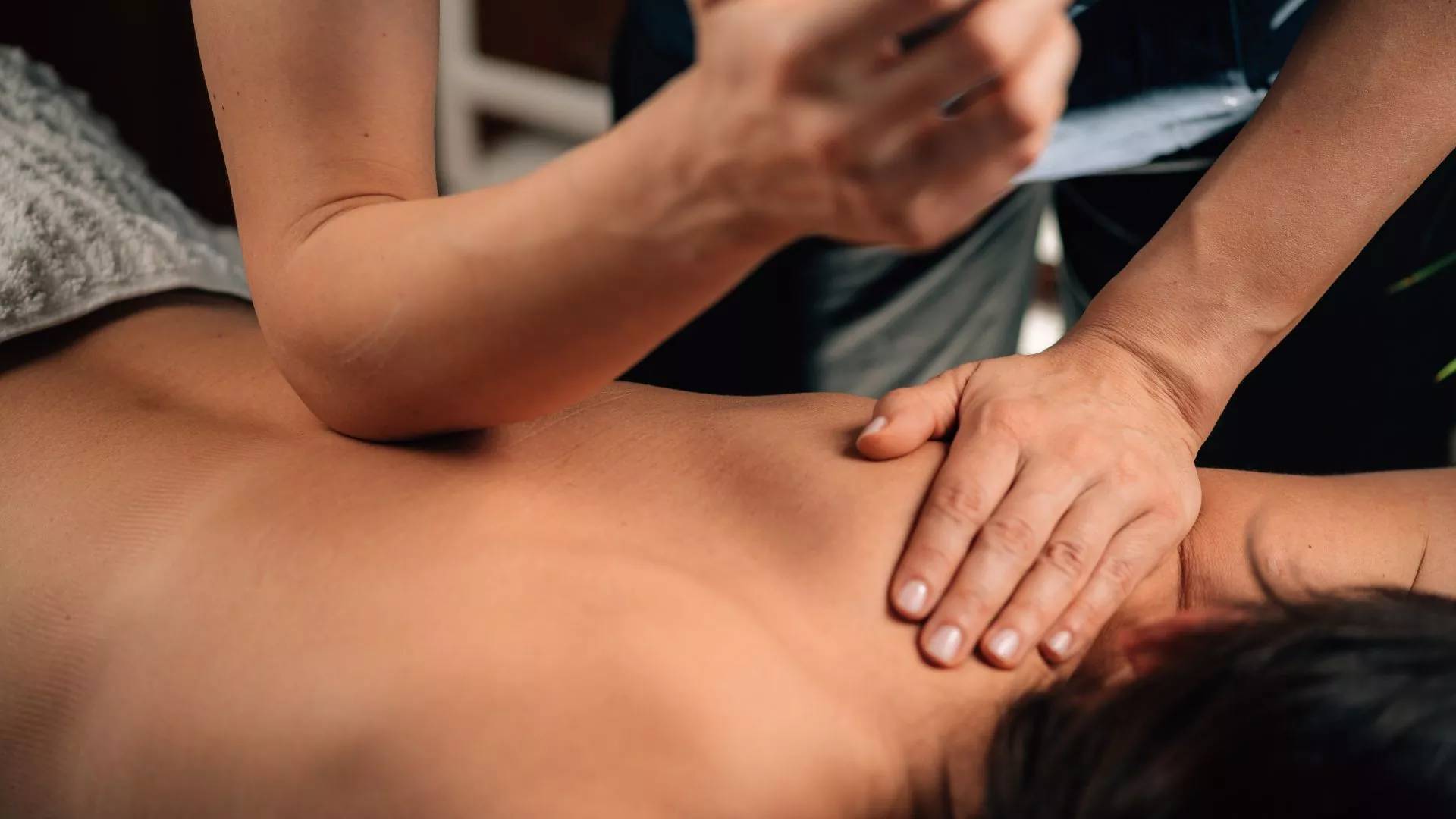 Deep tissue massage tool designed to relieve muscle tension, featuring ergonomic design for ease of use, available at THE SUK