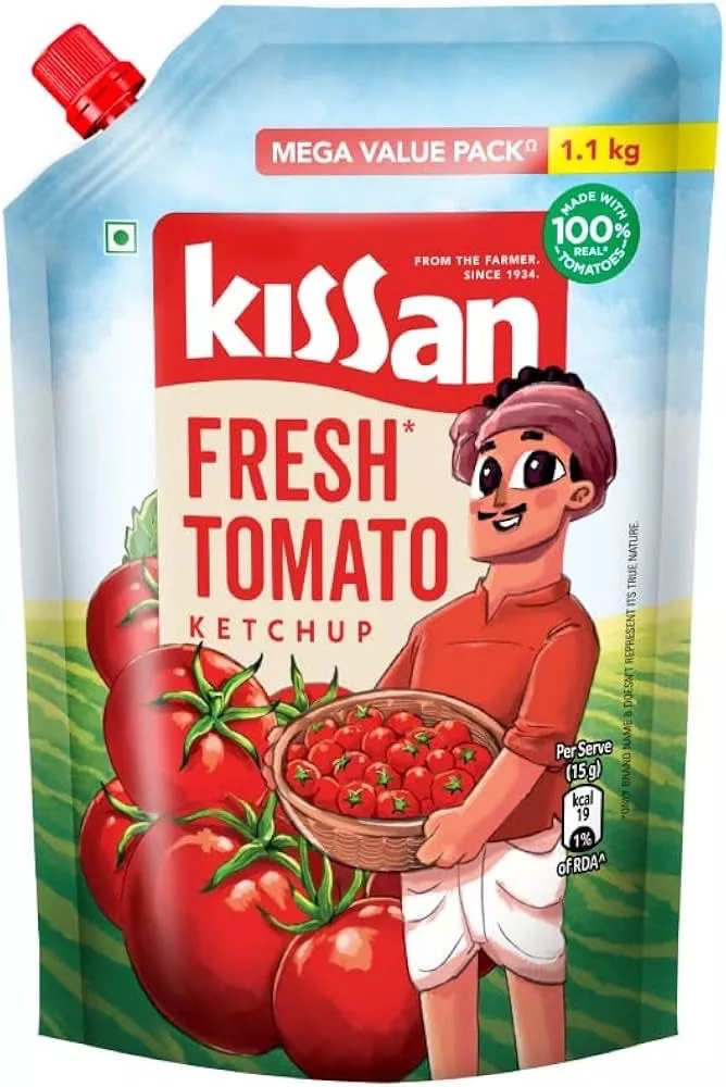Kissan Fresh Tomato Ketchup bottle showcasing its rich, tangy texture, perfect for enhancing meals, available at SHARMA BAKER