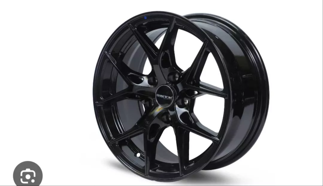 High-quality car rim designed for superior performance shown in a display at FRIENDS AUTO TRADERS in Ladwa.