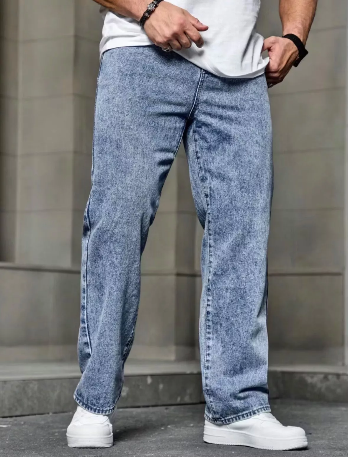 Premium men's jeans with a loose fit design, showcasing comfort and style, available at ASHOKA EMBROIDERY SUITS AND DUPATTA H