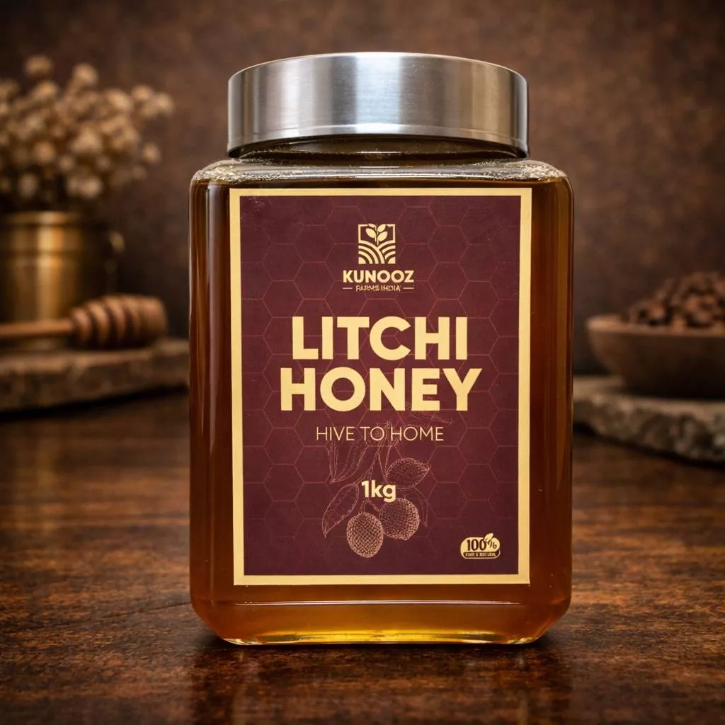 1kg jar of Kunooz Litchi Honey showcasing its rich golden hue and litchi floral notes, prominently displayed for buyers in Hy