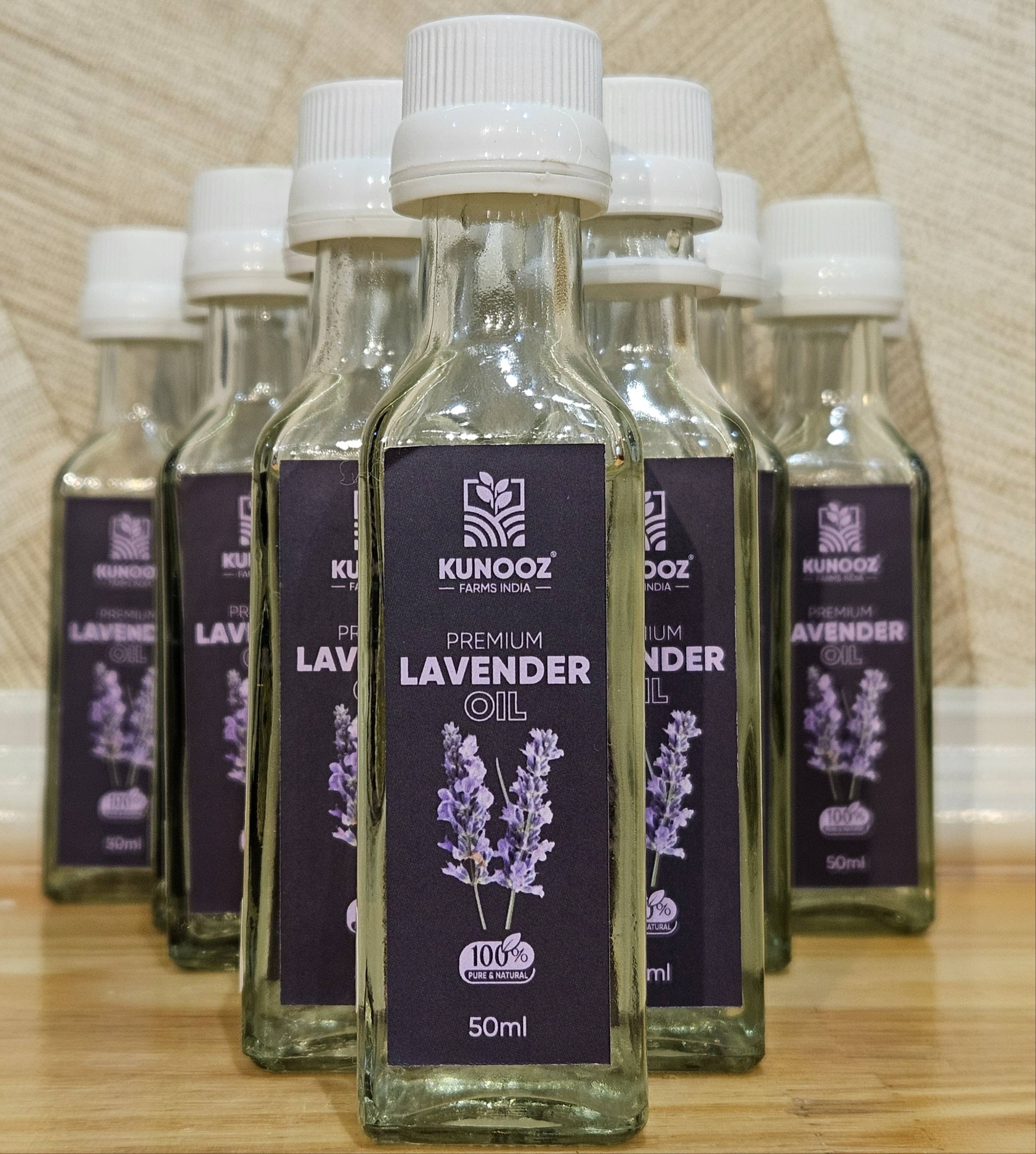 Kunooz Premium Lavender Oil bottle with a dark glass design showcasing the soothing lavender essence, set against a soft back