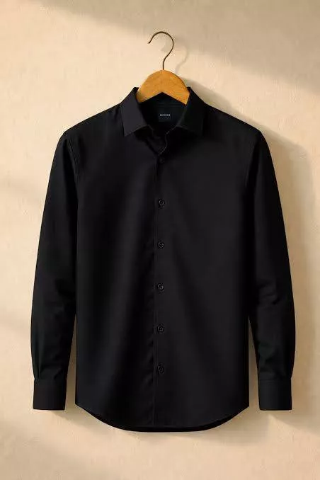 Sleek NRAERON GARMENTS Black Shirt displayed on a hanger in Jalandhar, showcasing its breathable fabric and stylish design.