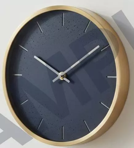 Elegant Modern Wall Clock with a stylish gold frame, designed for sophistication, displayed in a home setting in Shahbad