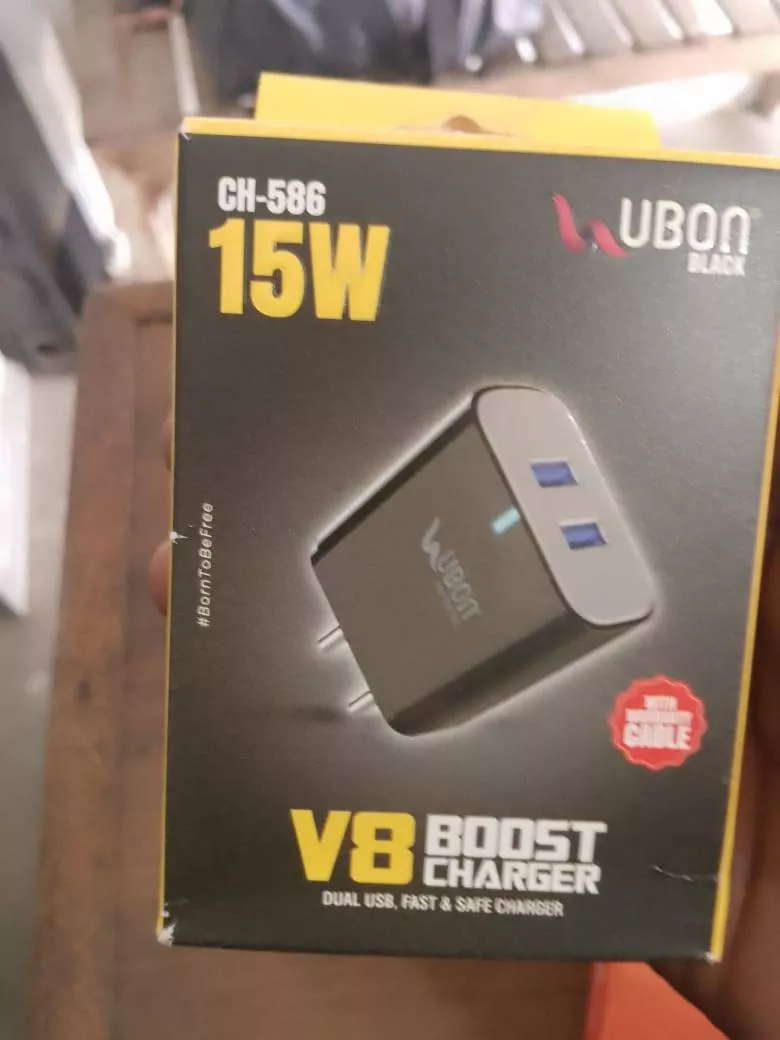 Ubon Charger in HOSHIARPUR featuring dual USB ports for fast 15W charging, compact design suitable for travel.