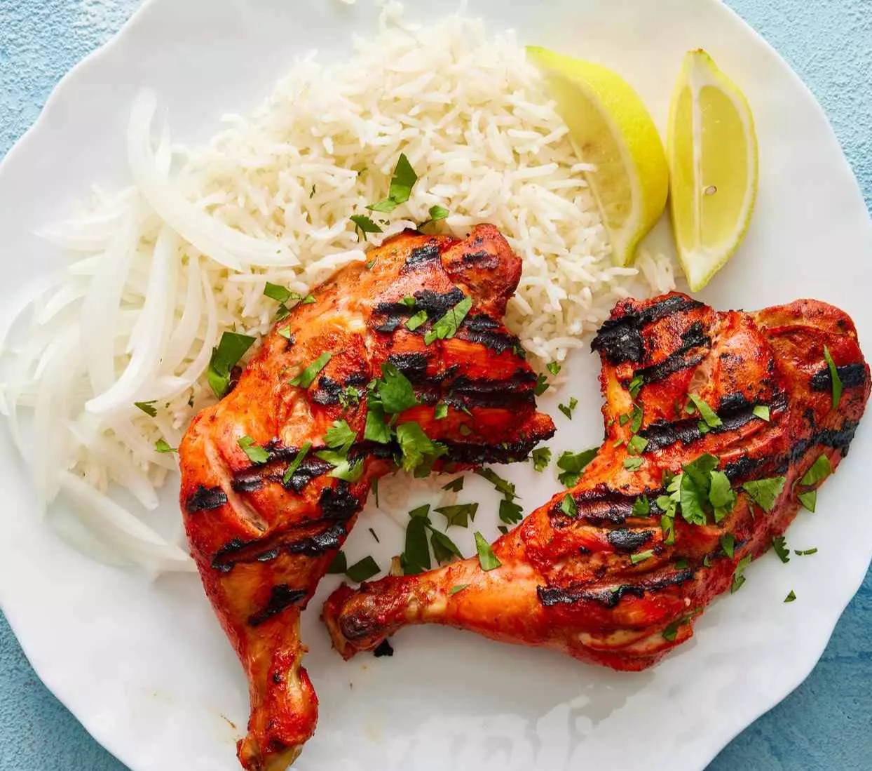 Delicious Sky Light Pizza Tandoori Chicken topped with succulent pieces of marinated chicken and spices in Gurdaspur