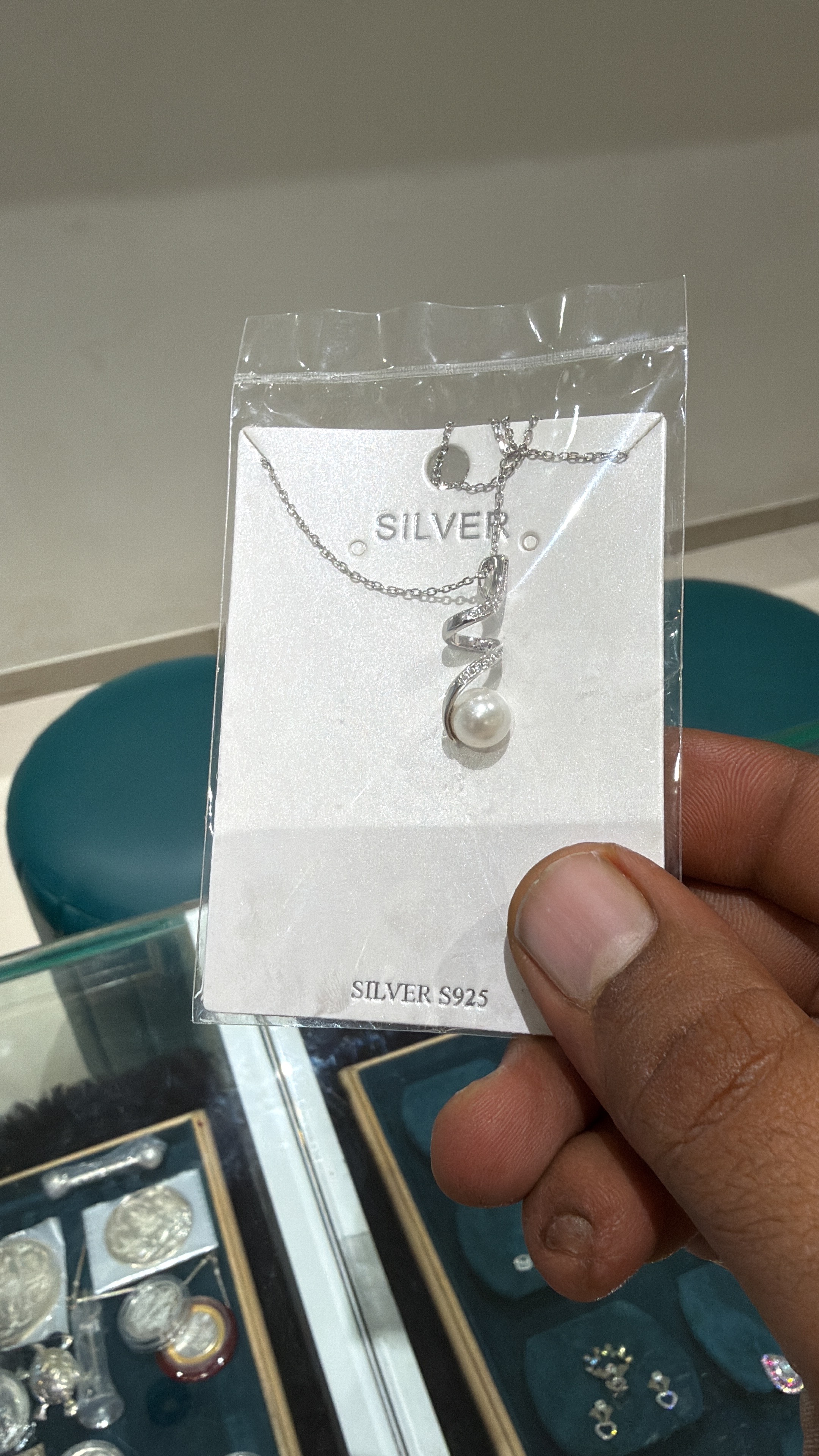 Sterling silver pearl pendant necklace featuring a beautiful pearl centerpiece, available at R K JEWELLERS in Rajkot.