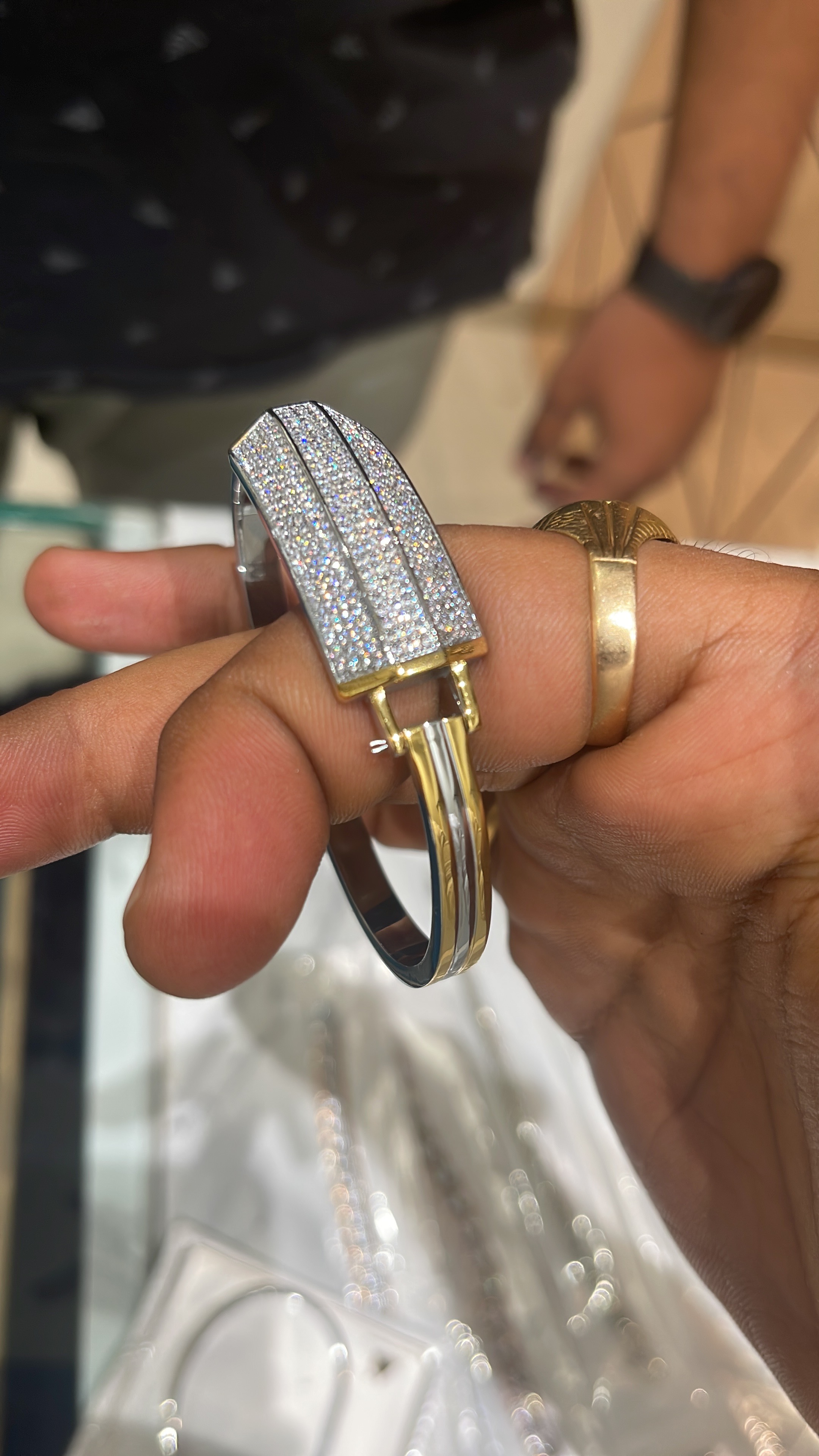 Elegant dual-tone silver bracelet studded with diamonds from R K JEWELLERS in Rajkot, showcasing luxurious design and craftsm
