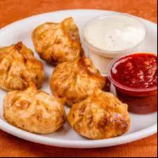 Kitchen Momos Maker designed for making dumplings quickly and easily, featuring a compact design with a user-friendly interfa