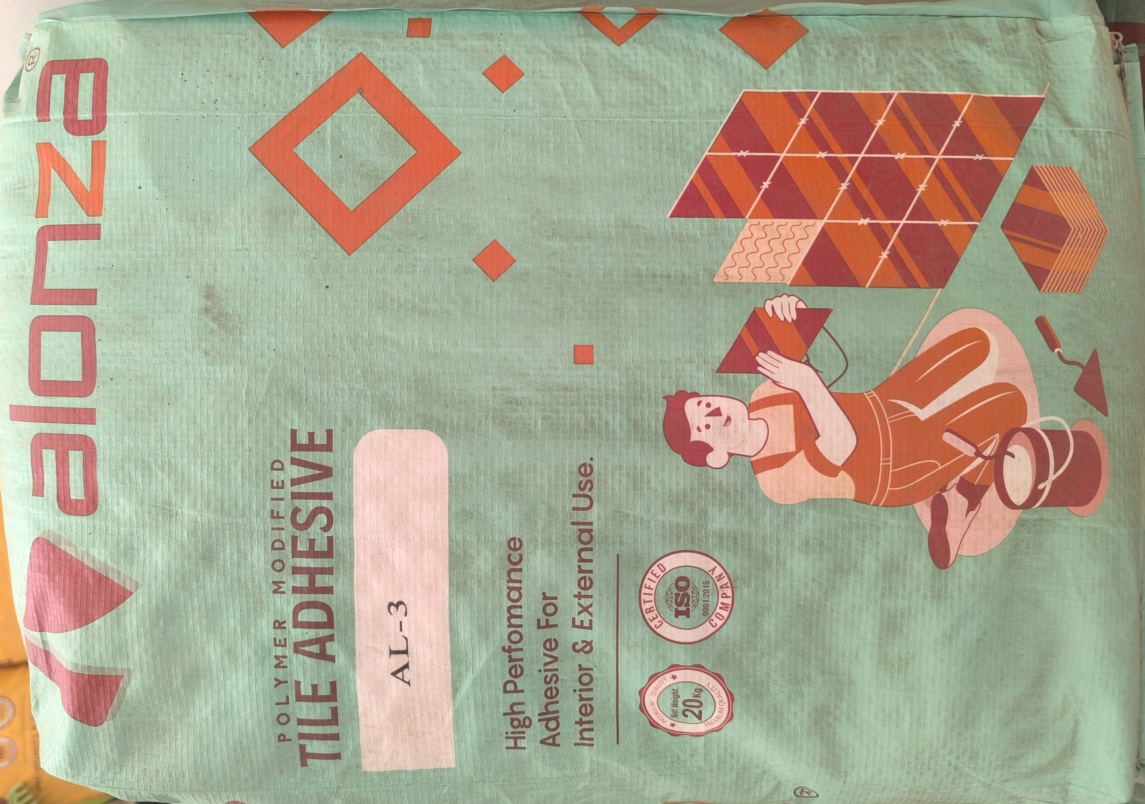 Alonza Polymer Modified Tile Adhesive container showing its packaging and branding, available in DHOLKA for construction proj