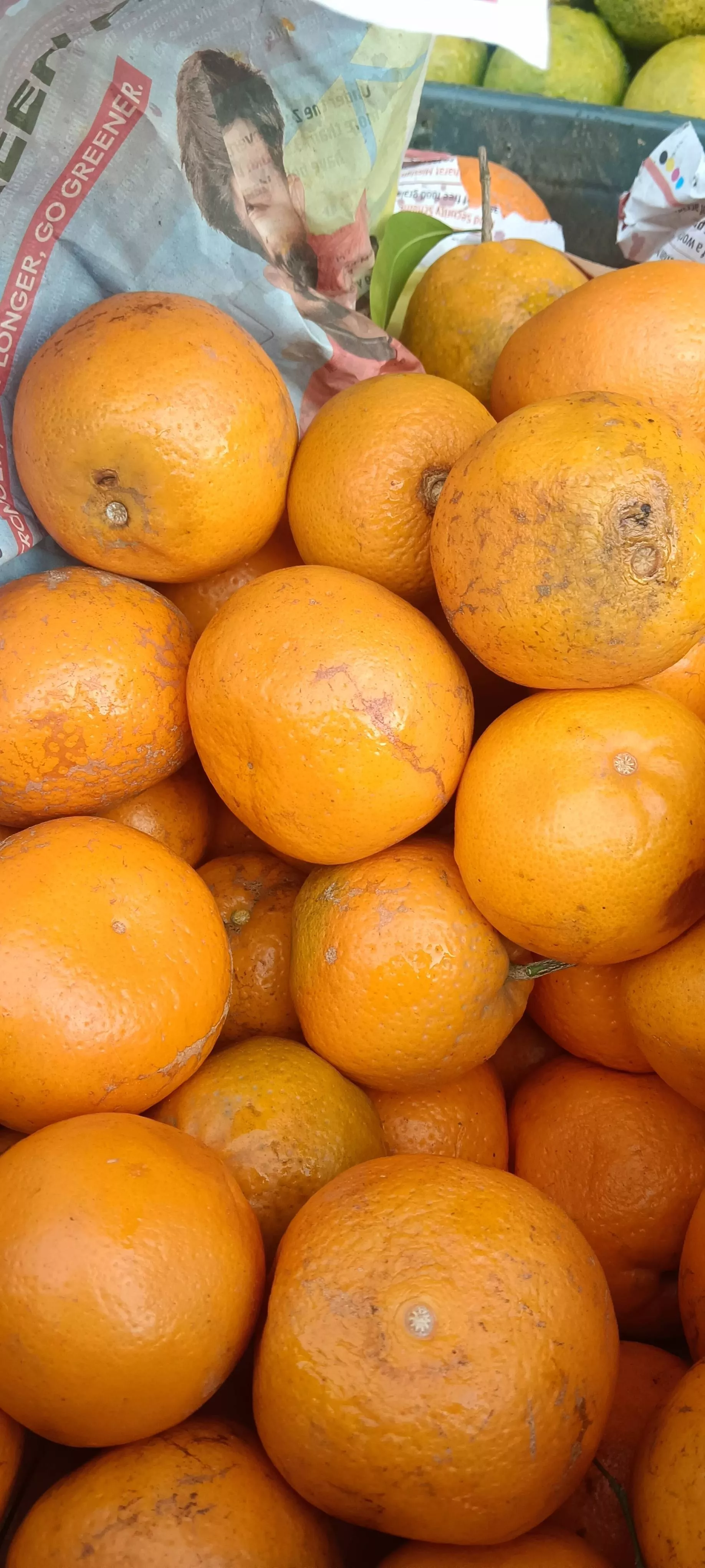 Freshly squeezed orange juice in a glass with vibrant color from RAJU JUICE CORNER in Barnala, ready to refresh.