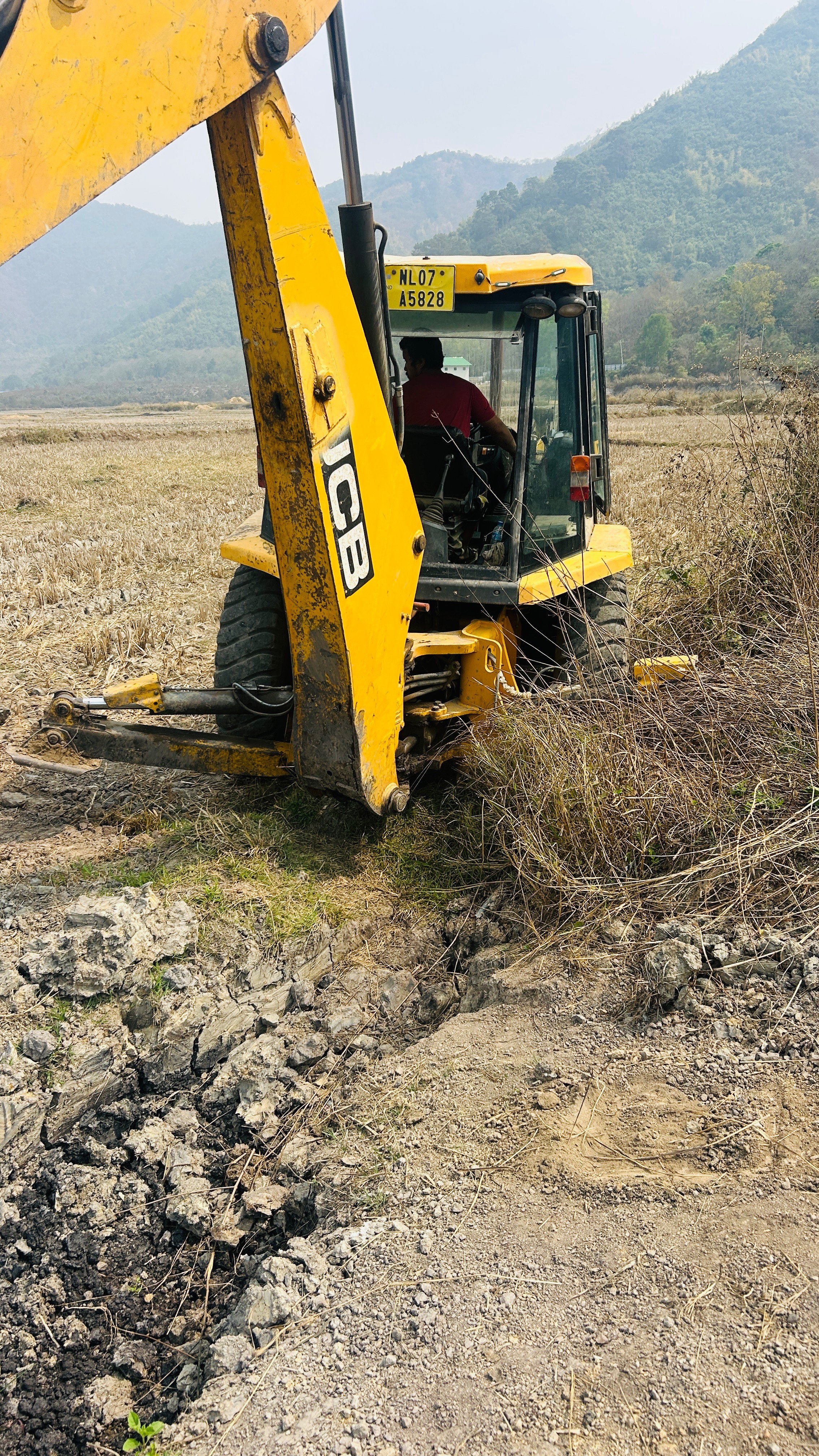 KHARIBAM JOHN SINGH - JCB Backhoe Loader in Imphal in IMPHAL