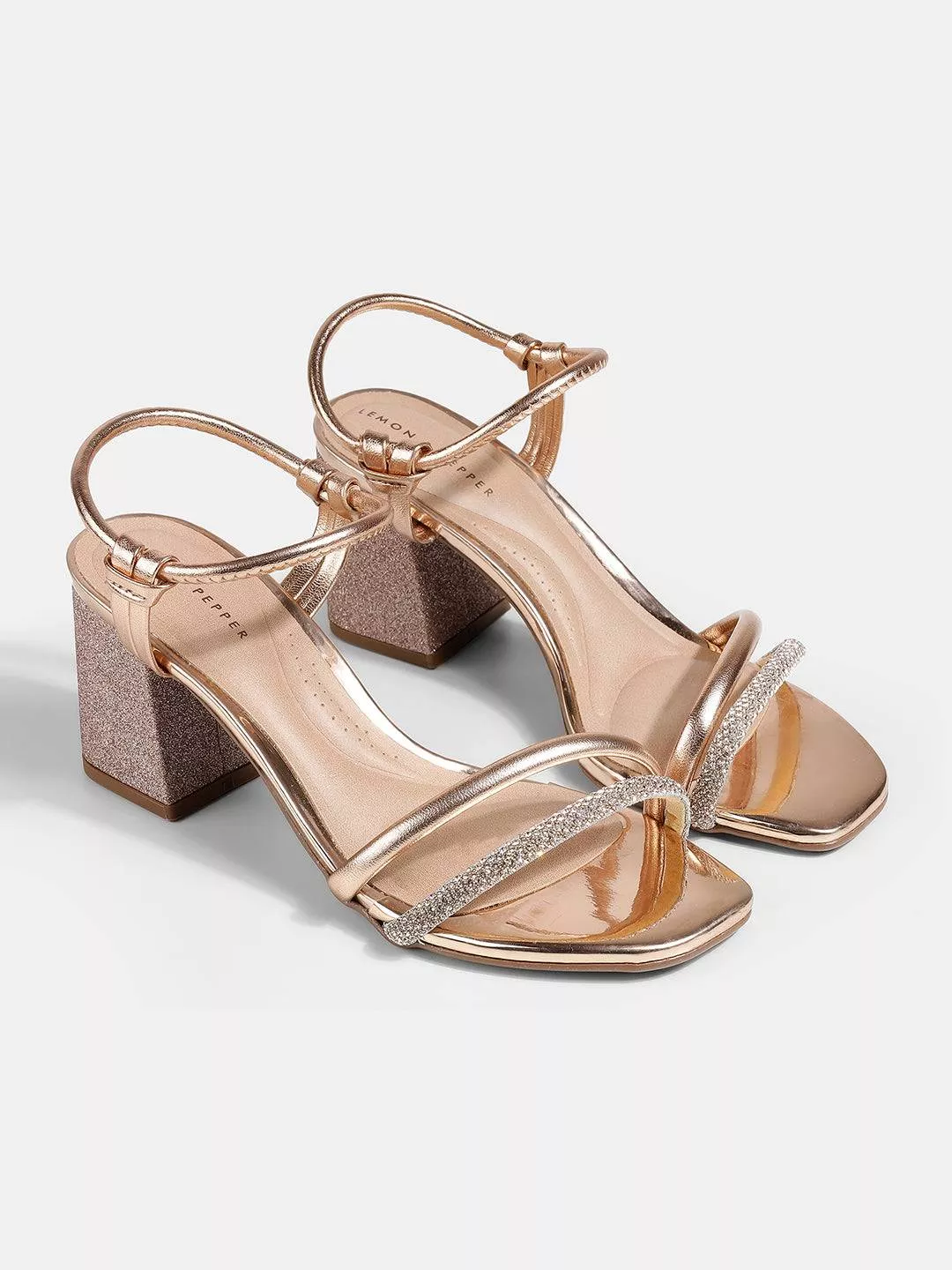 Chic metallic block heels with glitter accents from JAYSHREE FOOTWEAR in MANDVI, designed to add glamour to any outfit.