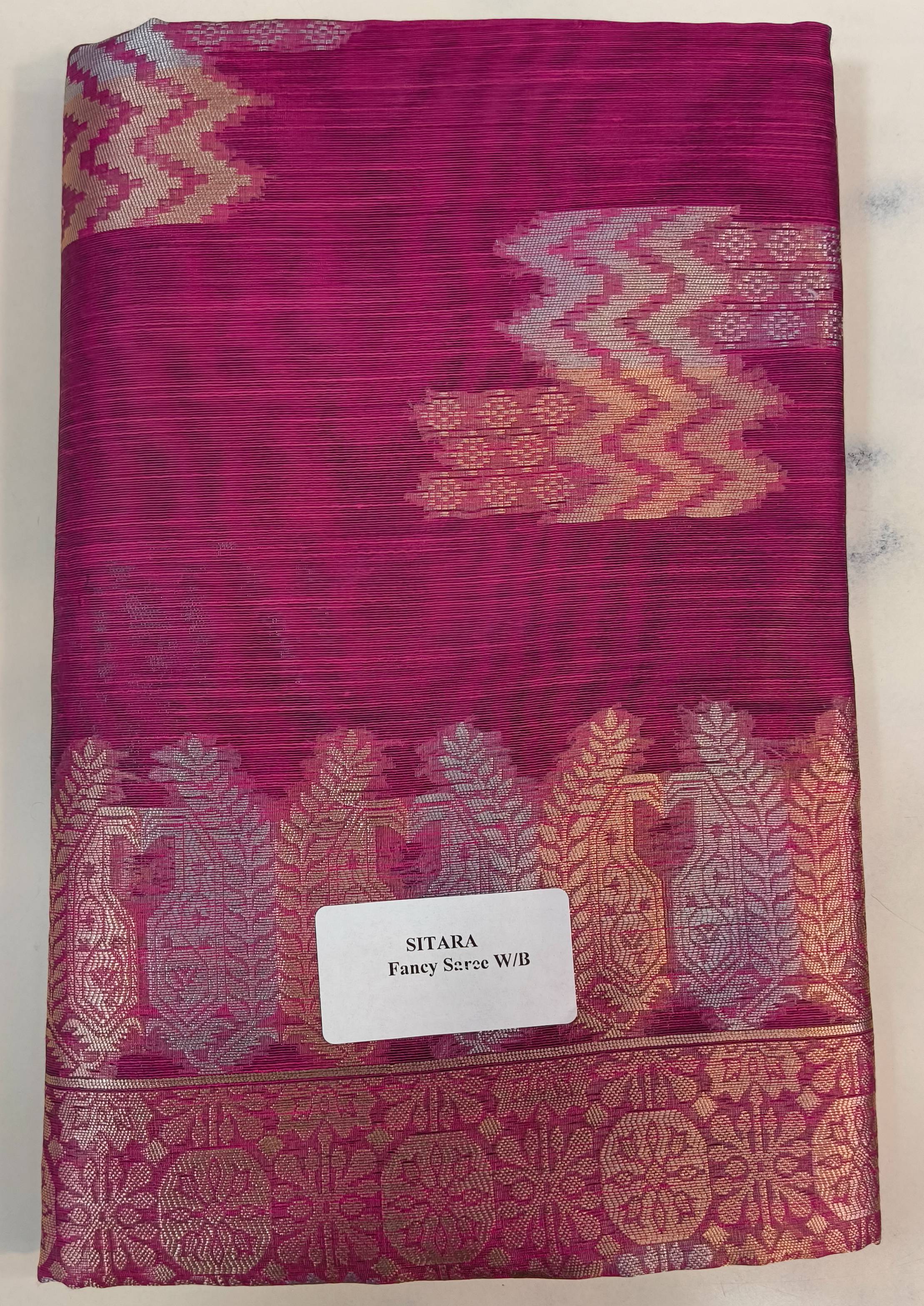 Elegant Lelan Silk Sitara Fancy Saree in vibrant colors with intricate traditional patterns displayed against a soft backgrou